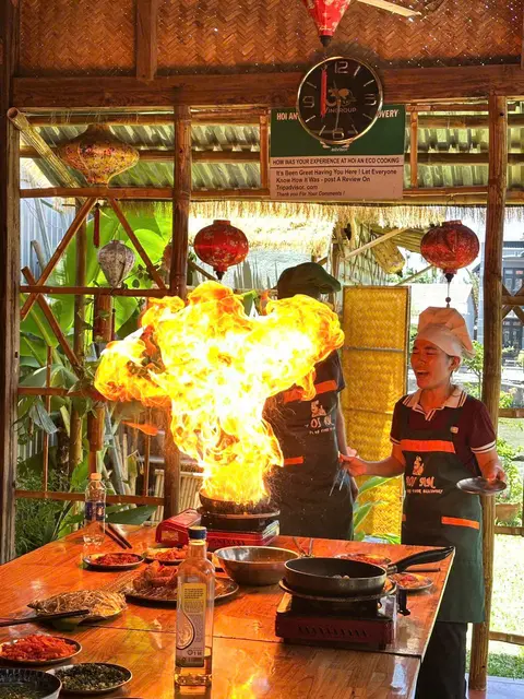A brilliant burst of flame from the cooking wok